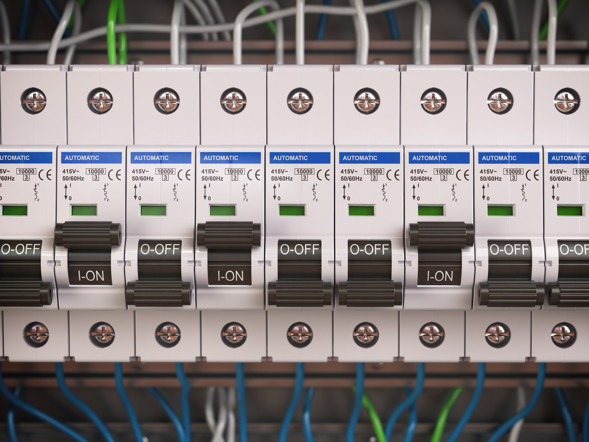 Electric switches in fusebox. Many black circuit brakers in a ro